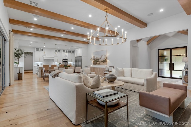 living area featuring recessed lighting, beam ceiling, visible vents, and light wood-style flooring