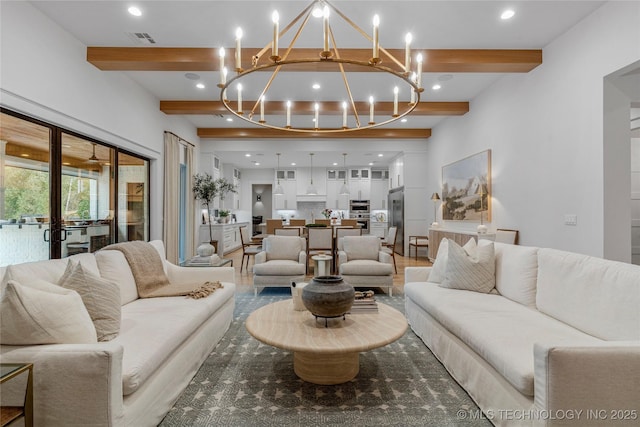 living room featuring a notable chandelier, visible vents, beam ceiling, and recessed lighting