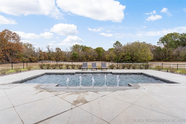 view of swimming pool with a fenced in pool, a patio, and fence