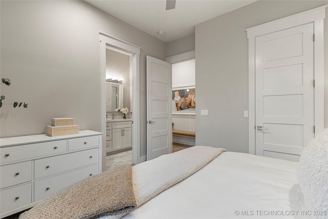 bedroom with a sink and ensuite bathroom