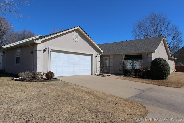 ranch-style house featuring a garage, driveway, and stucco siding