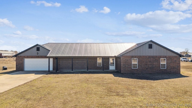 single story home featuring a front yard and brick siding