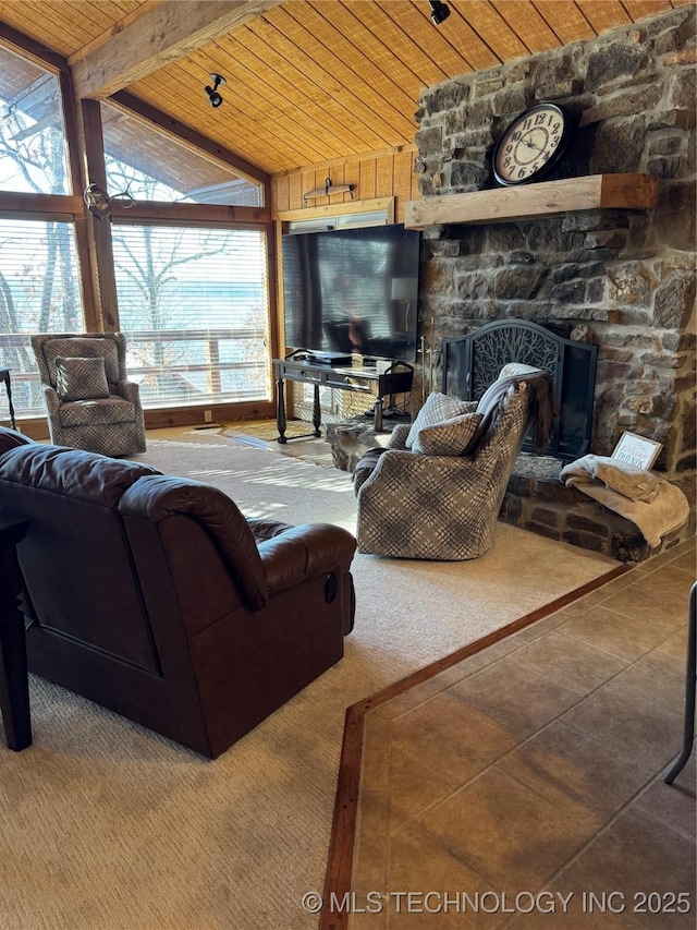 tiled living room with lofted ceiling with beams, wooden ceiling, and a fireplace