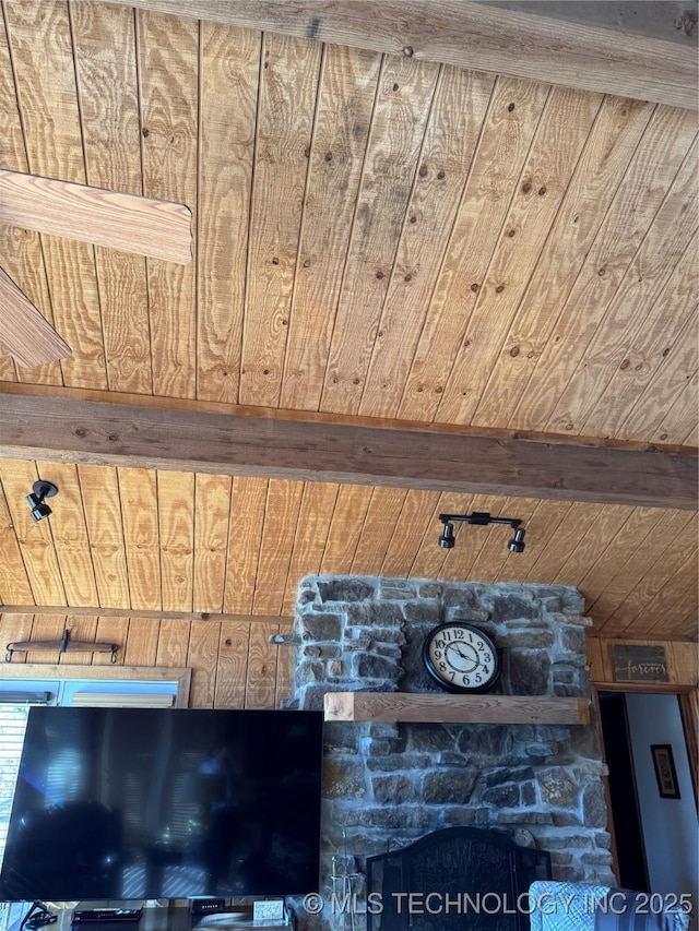 details featuring wooden ceiling and wooden walls