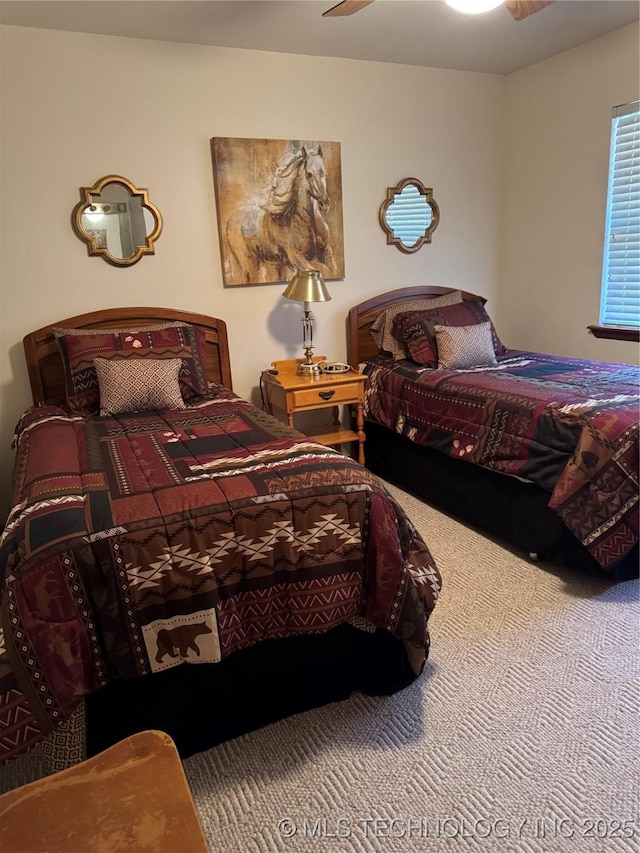 bedroom with carpet floors and ceiling fan