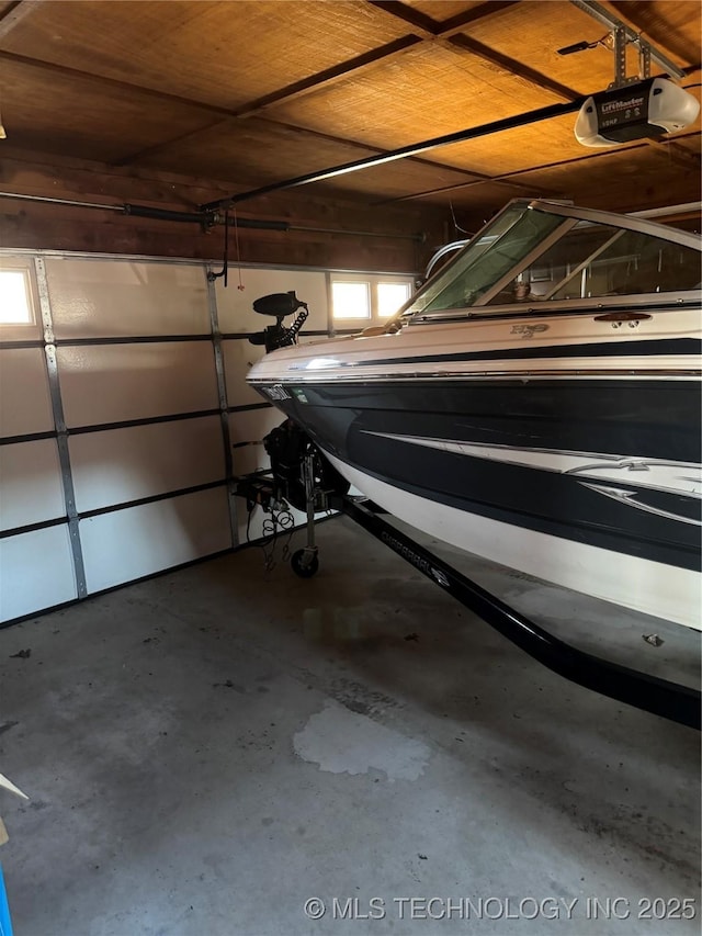 garage featuring a garage door opener