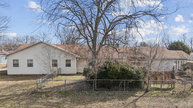 view of home's exterior with fence private yard and crawl space