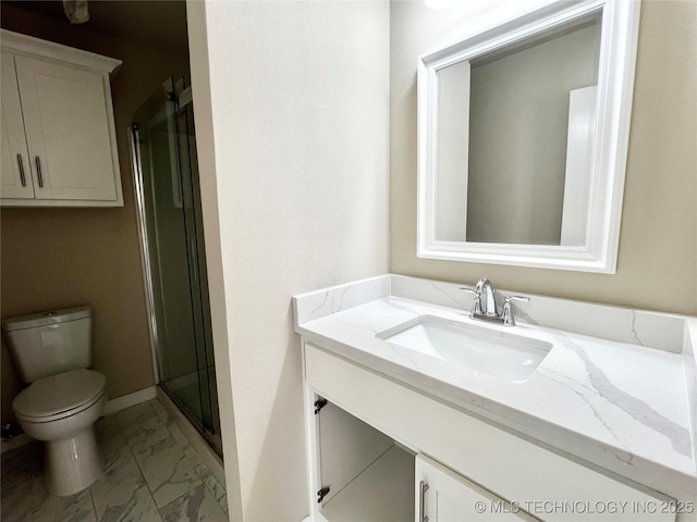 full bath with vanity, a shower stall, toilet, and marble finish floor