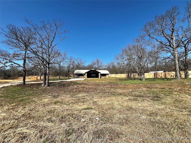 view of yard featuring fence