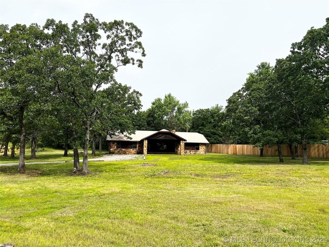 16306 N Javine Hill Rd, Skiatook, OK 74070 - view of yard featuring a pole building and an outdoor structure