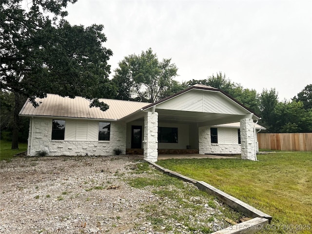 16306 N Javine Hill Rd, Skiatook, OK 74070 - view of front of property featuring stone siding and metal roof