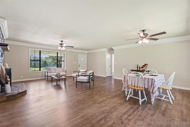 16306 N Javine Hill Rd, Skiatook, OK 74070 - dining space featuring ceiling fan, crown molding, dark wood-style flooring, and a fireplace with raised hearth