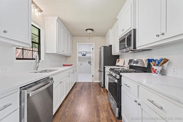 16306 N Javine Hill Rd, Skiatook, OK 74070 - kitchen featuring appliances with stainless steel finishes, tasteful backsplash, white cabinetry, and light countertops