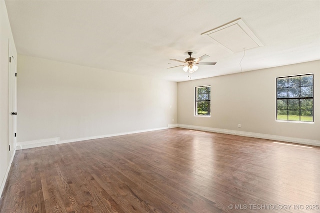 16306 N Javine Hill Rd, Skiatook, OK 74070 - spare room with attic access, wood finished floors, and a ceiling fan