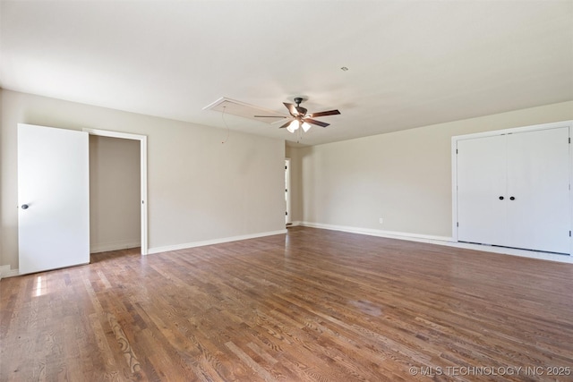 16306 N Javine Hill Rd, Skiatook, OK 74070 - spare room featuring attic access, wood finished floors, and a ceiling fan