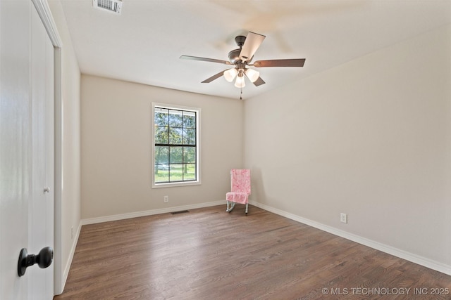 16306 N Javine Hill Rd, Skiatook, OK 74070 - spare room with wood finished floors and a ceiling fan