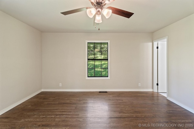 16306 N Javine Hill Rd, Skiatook, OK 74070 - spare room with dark wood-style floors and ceiling fan