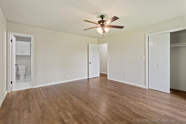 16306 N Javine Hill Rd, Skiatook, OK 74070 - unfurnished bedroom with wood finished floors, a closet, connected bathroom, and ceiling fan