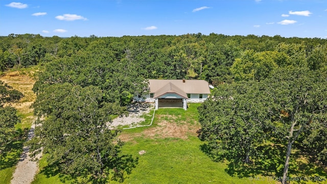 16306 N Javine Hill Rd, Skiatook, OK 74070 - view from above of property with a heavily wooded area