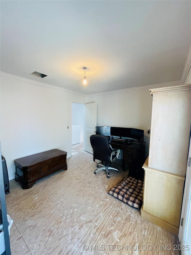 office space featuring ornamental molding, wood finished floors, and visible vents