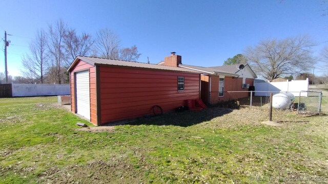 103877 US Highway 59 N, Sallisaw, OK 74955 - view of side of home featuring a chimney and metal roof