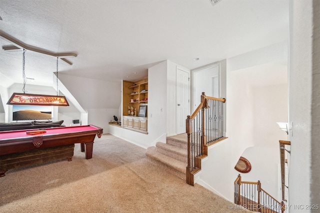 recreation room featuring carpet floors, billiards, a textured ceiling, and baseboards