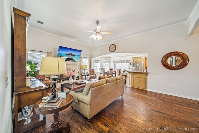 living room with ceiling fan, dark wood finished floors, visible vents, and baseboards