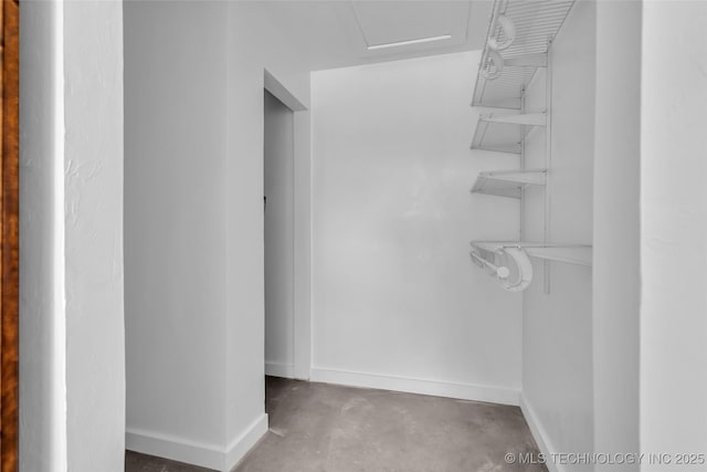 spacious closet with attic access