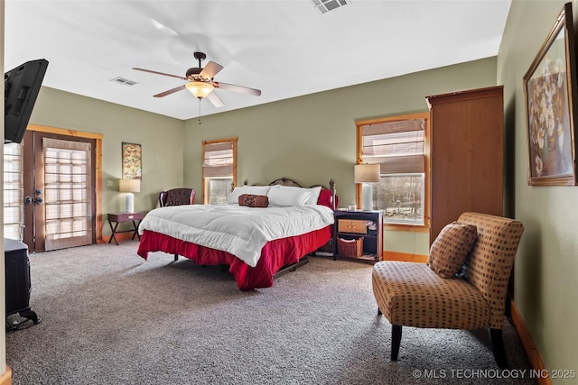 bedroom with carpet, visible vents, and ceiling fan