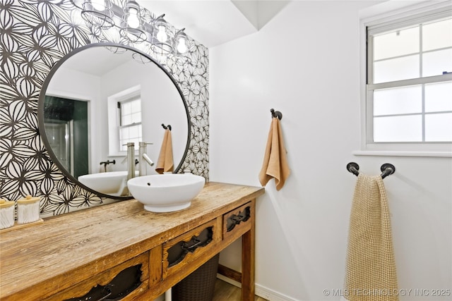 bathroom featuring vanity and baseboards