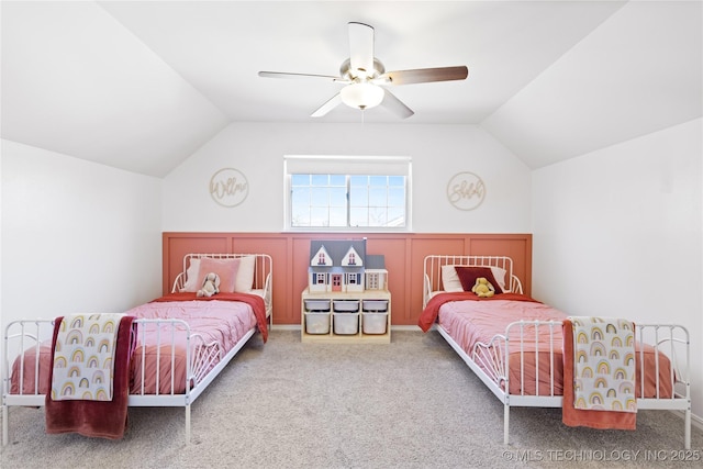 bedroom featuring vaulted ceiling, ceiling fan, and carpet