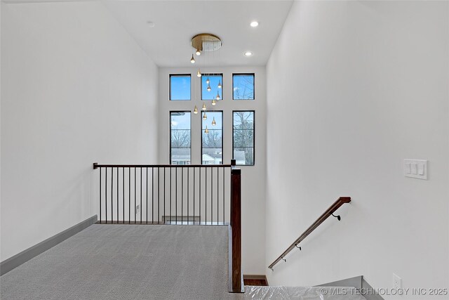 227 E 35th St, Tulsa, OK 74105 - staircase with recessed lighting, carpet flooring, and baseboards