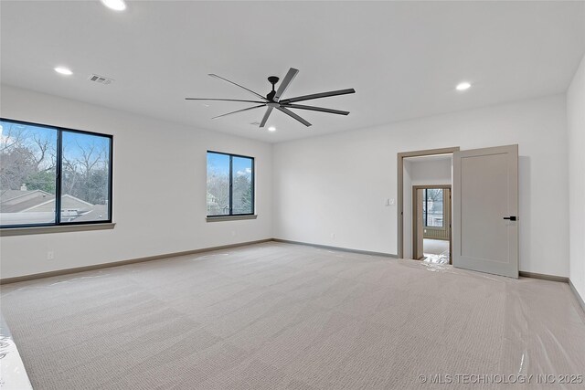 227 E 35th St, Tulsa, OK 74105 - unfurnished room with light carpet, recessed lighting, ceiling fan, and baseboards