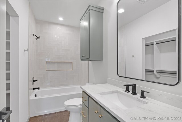 227 E 35th St, Tulsa, OK 74105 - bathroom featuring vanity, toilet, shower / tub combination, tile patterned floors, and recessed lighting