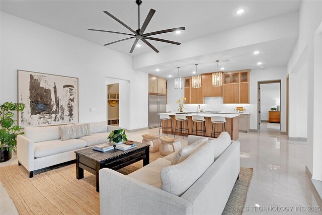 227 E 35th St, Tulsa, OK 74105 - living room with a ceiling fan and recessed lighting