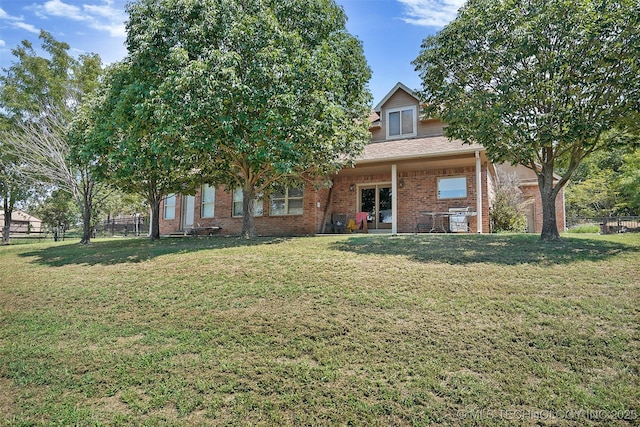 1474 S 271st W Ave, Sand Springs, OK 74063 - view of front of property featuring fence, brick siding, and a front yard