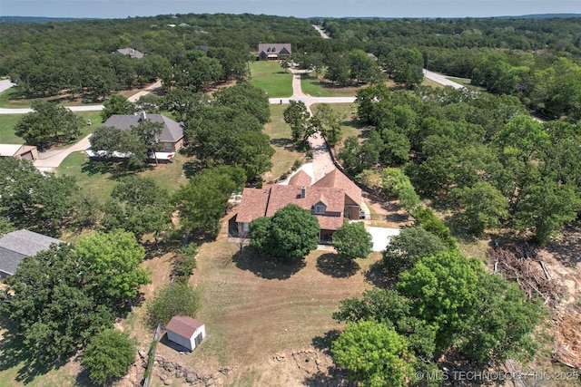 1474 S 271st W Ave, Sand Springs, OK 74063 - drone / aerial view featuring a wooded view