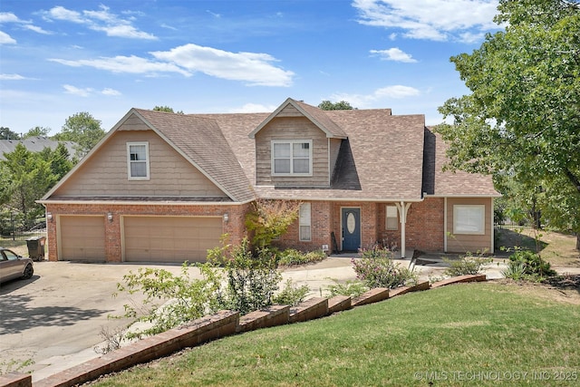1474 S 271st W Ave, Sand Springs, OK 74063 - view of front of property featuring roof with shingles, driveway, brick siding, an attached garage, and a front yard