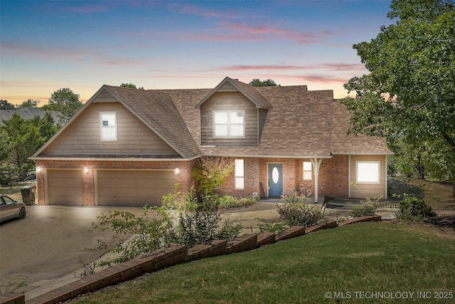 1474 S 271st W Ave, Sand Springs, OK 74063 - view of front of property with a lawn, brick siding, driveway, and a shingled roof