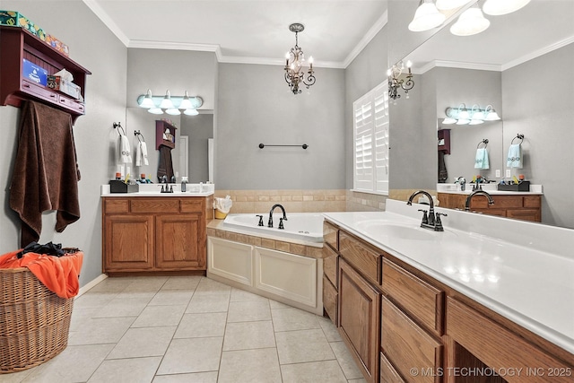 1474 S 271st W Ave, Sand Springs, OK 74063 - bathroom with a notable chandelier, a sink, tile patterned floors, a bath, and ornamental molding