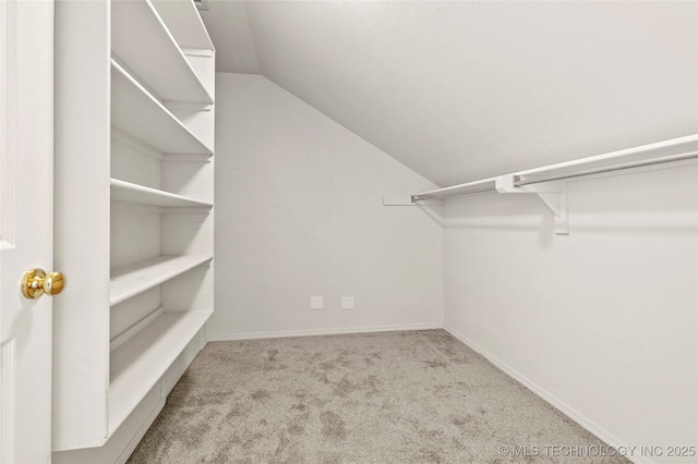 1474 S 271st W Ave, Sand Springs, OK 74063 - spacious closet with vaulted ceiling and carpet