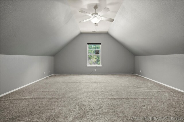 1474 S 271st W Ave, Sand Springs, OK 74063 - bonus room with carpet floors, a ceiling fan, lofted ceiling, and a textured ceiling