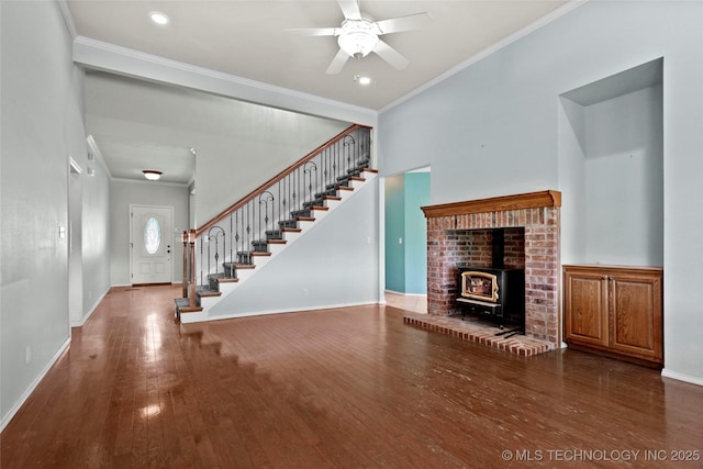 1474 S 271st W Ave, Sand Springs, OK 74063 - unfurnished living room featuring ornamental molding, stairs, a wood stove, hardwood / wood-style floors, and ceiling fan