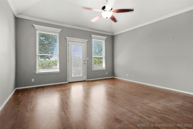1474 S 271st W Ave, Sand Springs, OK 74063 - spare room with healthy amount of natural light, a ceiling fan, wood finished floors, and crown molding