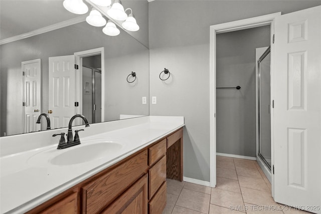 1474 S 271st W Ave, Sand Springs, OK 74063 - bathroom featuring ornamental molding, vanity, a shower stall, tile patterned flooring, and a chandelier