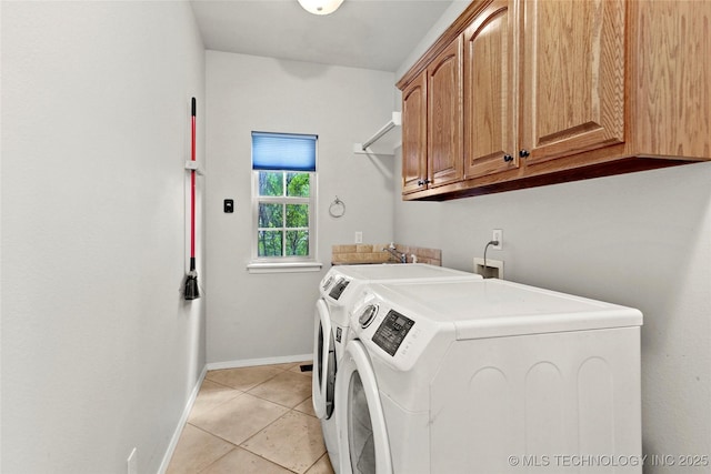 1474 S 271st W Ave, Sand Springs, OK 74063 - washroom featuring cabinet space, washing machine and dryer, and light tile patterned floors