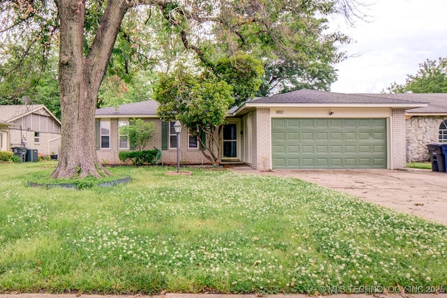 single story home featuring a garage, central AC, brick siding, concrete driveway, and a front yard