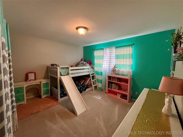 bedroom featuring carpet