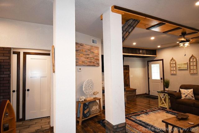 living area featuring ornate columns, recessed lighting, a ceiling fan, and wood finished floors