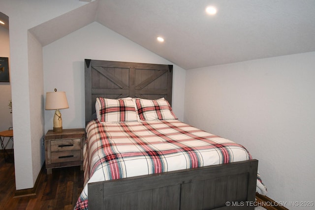 bedroom featuring lofted ceiling, wood finished floors, and recessed lighting